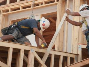 construction workers building house